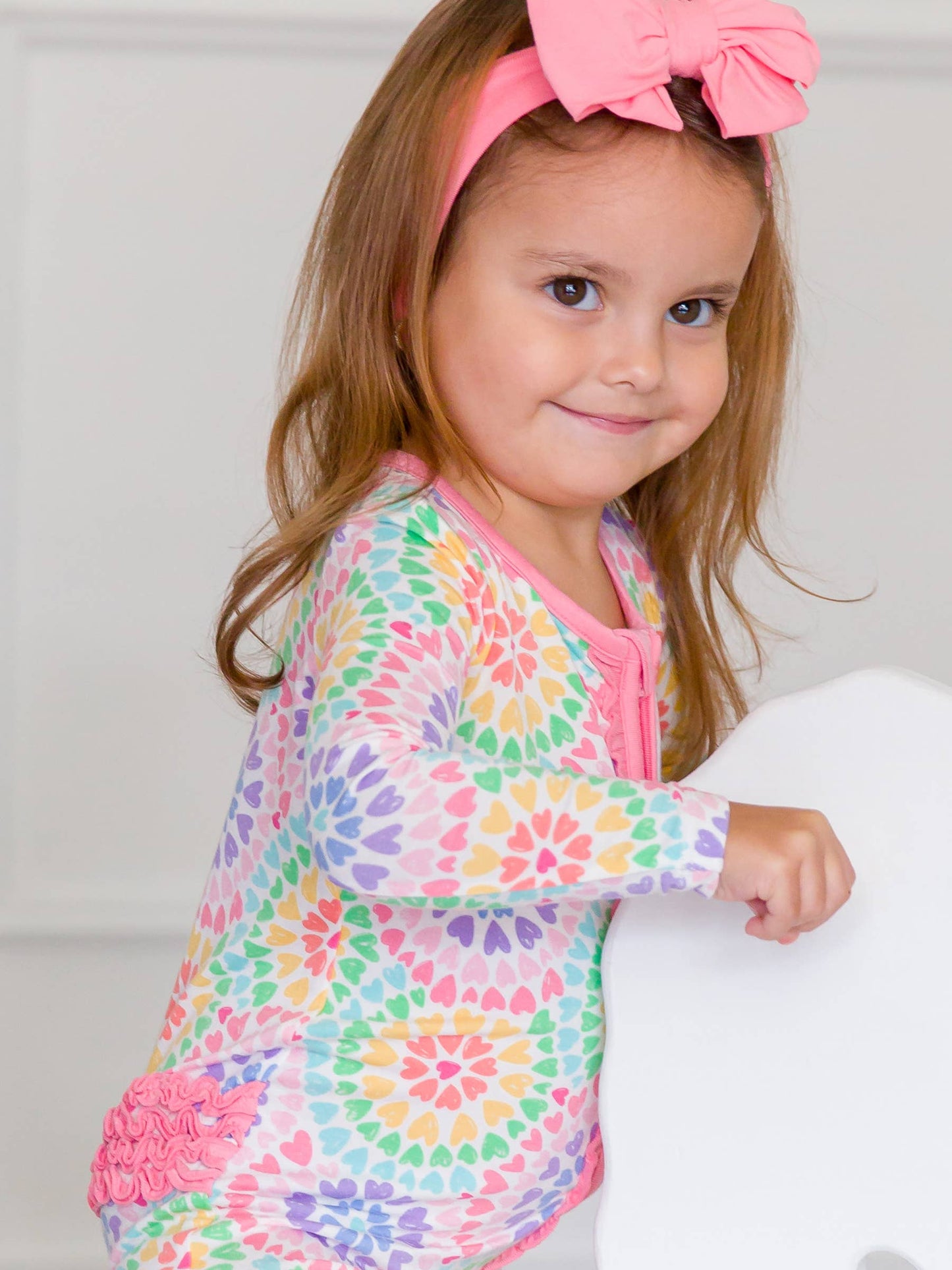 RuffleButts + RuggedButts - Baby Girls Rainbow Kaleidoscope Hearts Bamboo Viscose Footed Ruffle One Piece Pajama